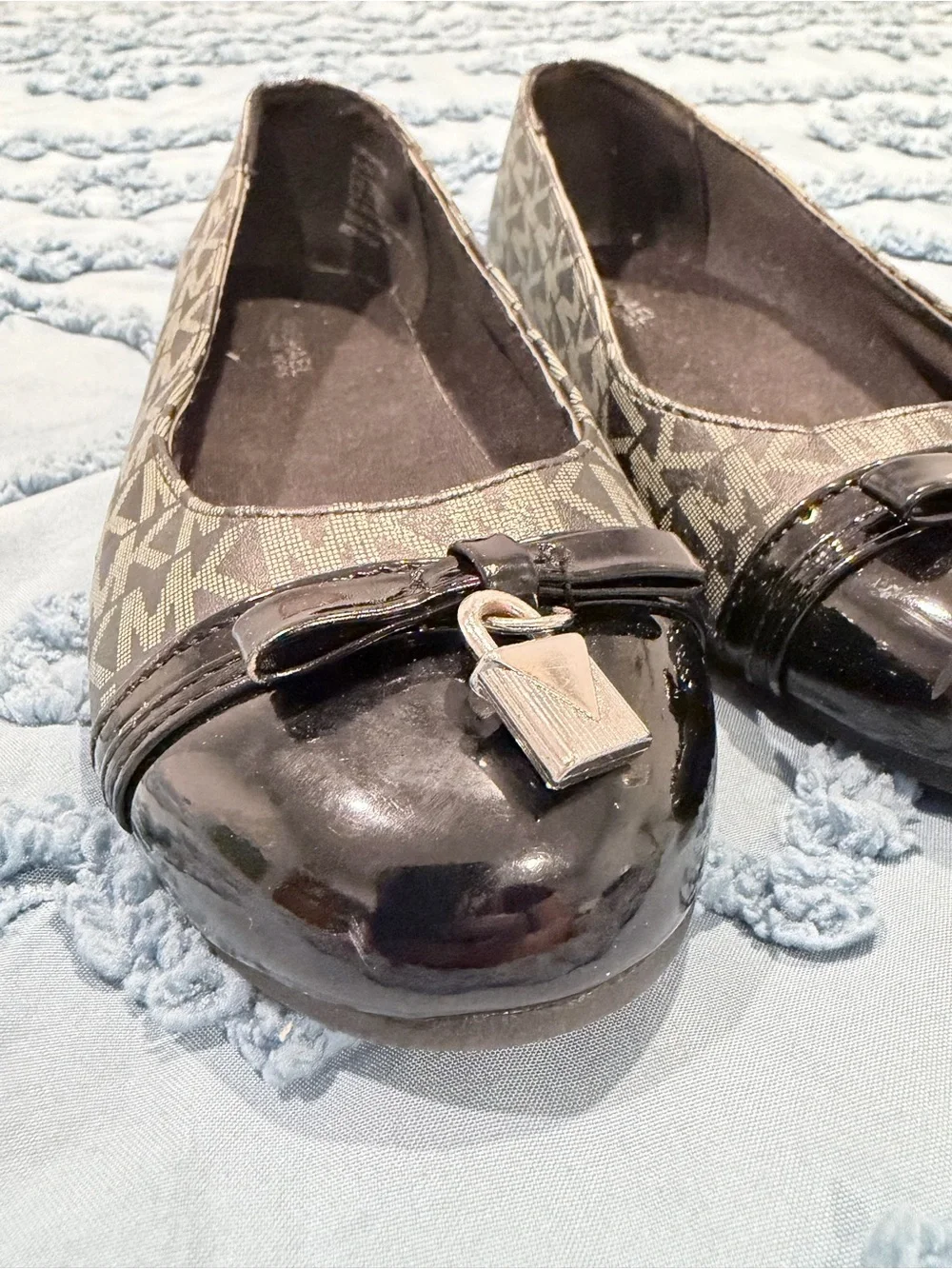 Michael Kors Black Logo Ballet Flats with Silver Lock Accent